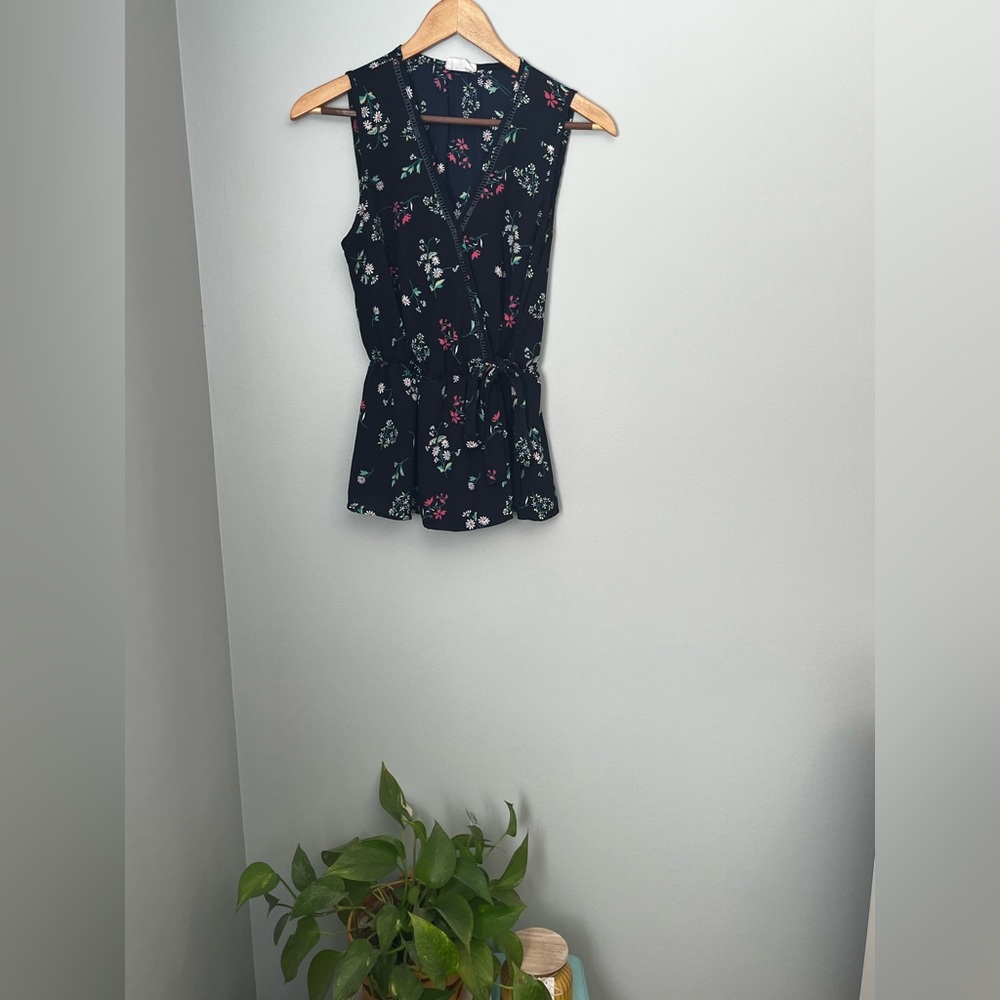 Peplum faux wrap floral shirt